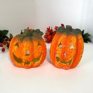 Pumpkin candle holders.